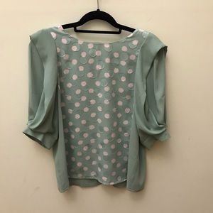 Green polka dot blouse